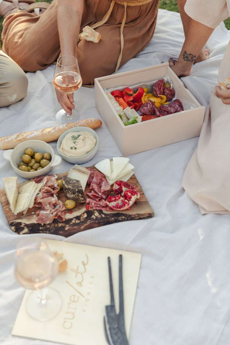 Enjoy Mallorca with Cure/ate's gourmet picnic boxes and boards,